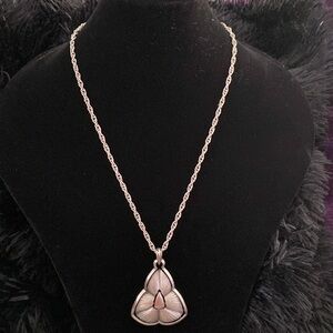 silver necklace on a thick chain 23 in